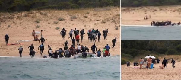스페인 해안가에서 해수욕을 즐기던 시민들이 난민들을 보고 두려움에 떨고 있다. [인터넷 캡처]