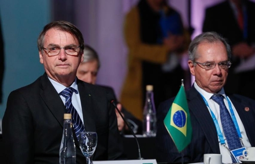 브라질의 보우소나루 대통령(왼쪽)과 파울루 게지스 경제부 장관